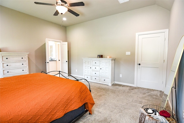 bedroom featuring lofted ceiling, recessed lighting, light colored carpet, ceiling fan, and baseboards