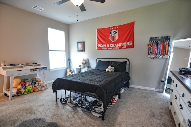 carpeted bedroom featuring ceiling fan