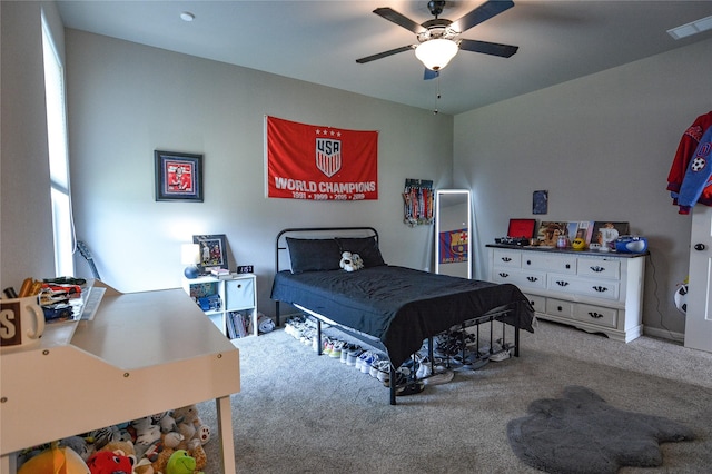 bedroom featuring ceiling fan and carpet floors