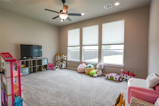 playroom with carpet floors, recessed lighting, visible vents, a ceiling fan, and baseboards