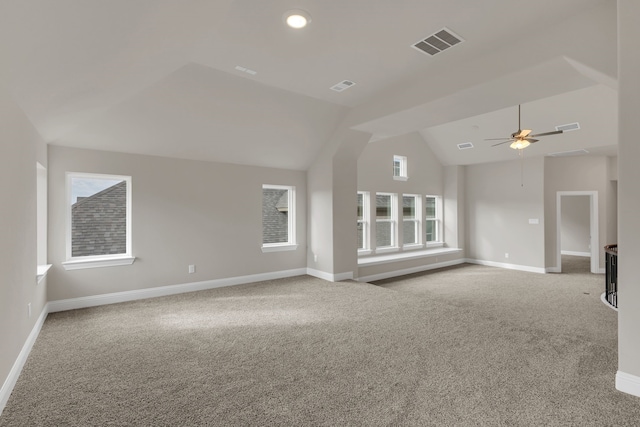 unfurnished living room with carpet, ceiling fan, and lofted ceiling