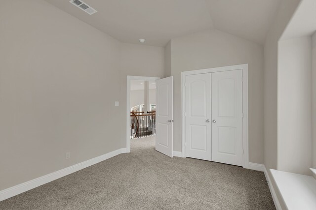 full bathroom featuring tile patterned flooring, vanity, tiled shower / bath combo, and toilet