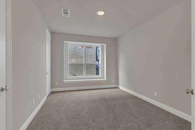 view of carpeted spare room