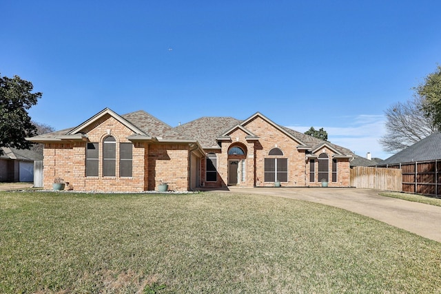 single story home with a front yard