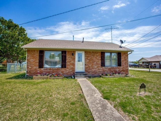 view of front of property with a front lawn