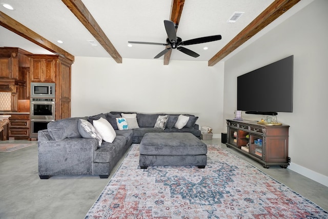 living room featuring ceiling fan and beamed ceiling