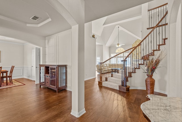 interior space with ceiling fan and hardwood / wood-style floors