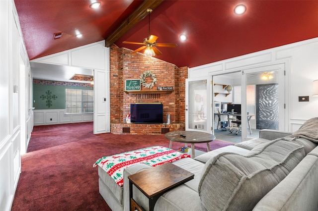 living room with beamed ceiling, ceiling fan, carpet flooring, and high vaulted ceiling