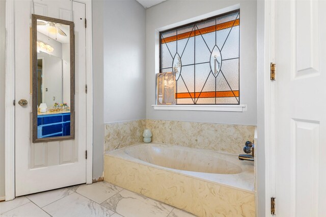 bathroom featuring a tub to relax in