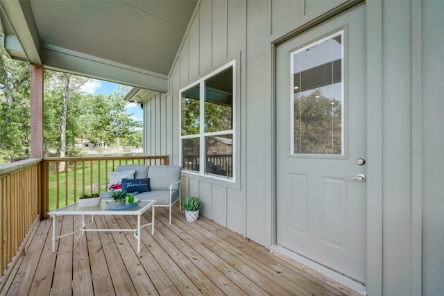 unfurnished sunroom featuring vaulted ceiling