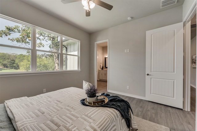 bedroom featuring ceiling fan and light hardwood / wood-style floors