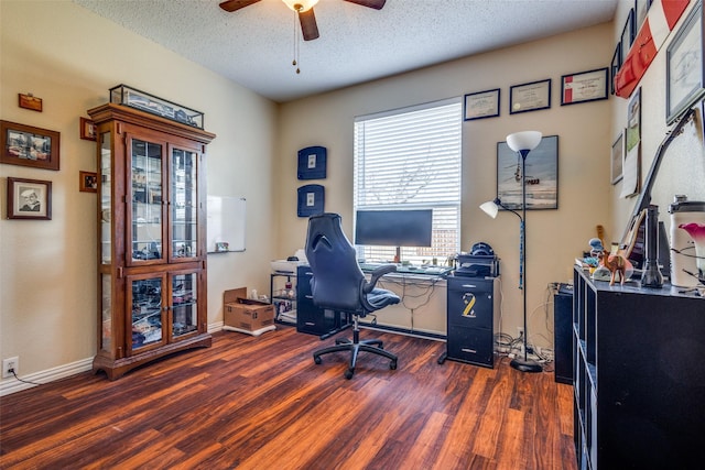 office with plenty of natural light, ceiling fan, dark hardwood / wood-style flooring, and a textured ceiling