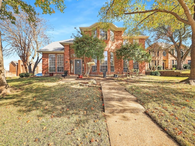 view of front facade with a front yard