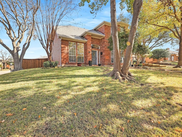 view of front facade with a front lawn