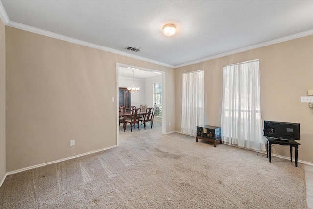 interior space with crown molding and a chandelier