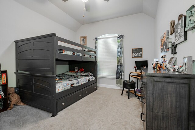 carpeted bedroom featuring ceiling fan and lofted ceiling