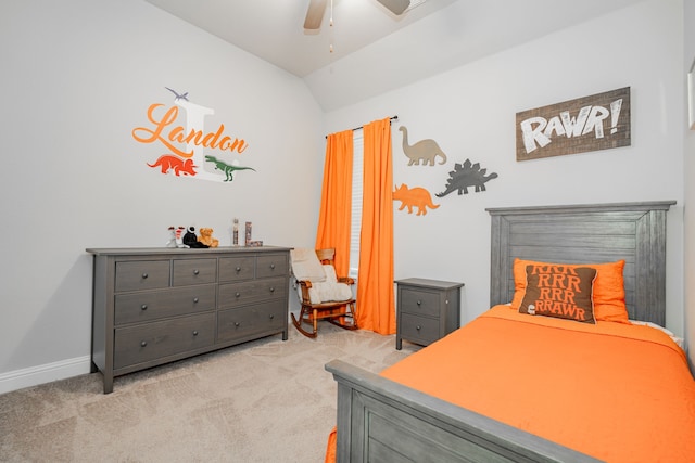 bedroom with ceiling fan, light colored carpet, and lofted ceiling