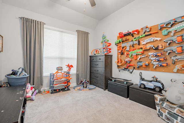 playroom with carpet flooring, ceiling fan, and lofted ceiling