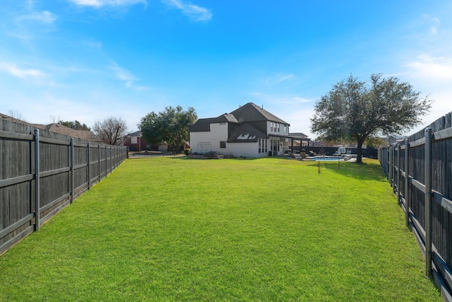 view of yard with a trampoline