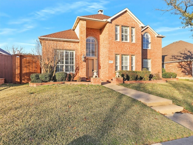 front facade featuring a front lawn