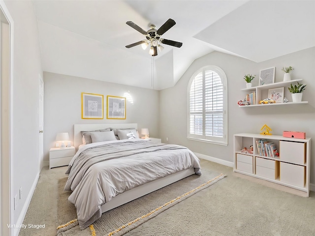 bedroom with carpet flooring, ceiling fan, and lofted ceiling