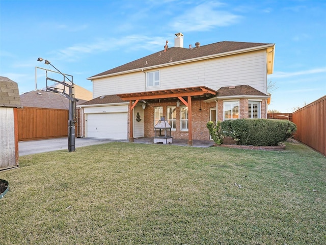 back of house with a lawn and a patio