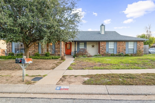 view of front facade featuring a front yard