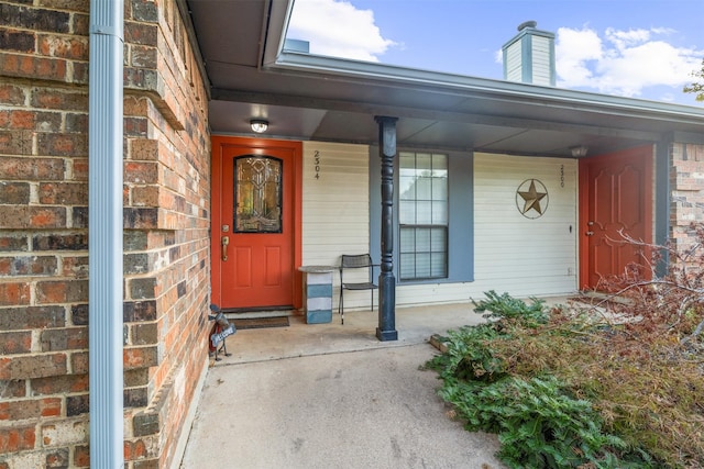 entrance to property with covered porch