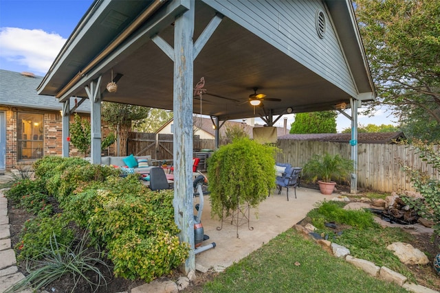 view of patio featuring ceiling fan and an outdoor living space