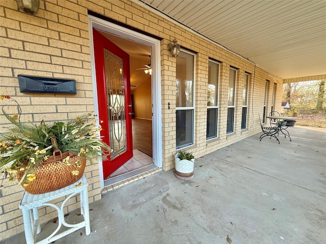 doorway to property featuring covered porch