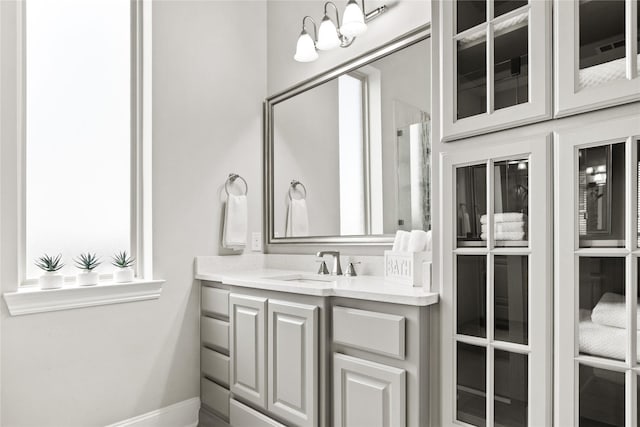 bathroom featuring vanity and walk in shower