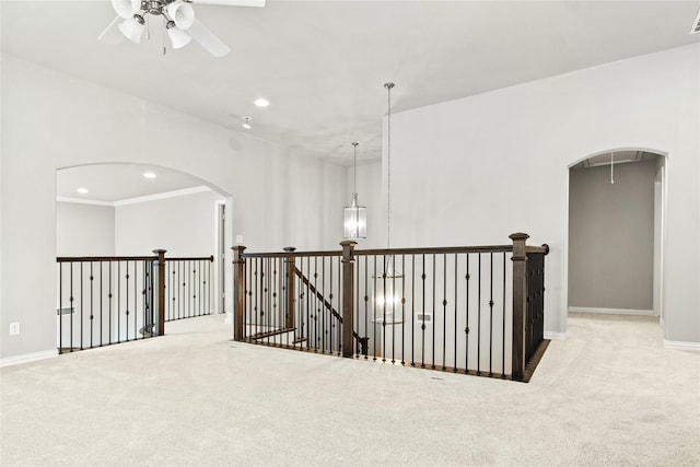 hallway featuring light carpet