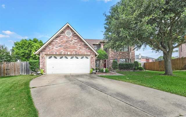 front facade with a garage and a front lawn