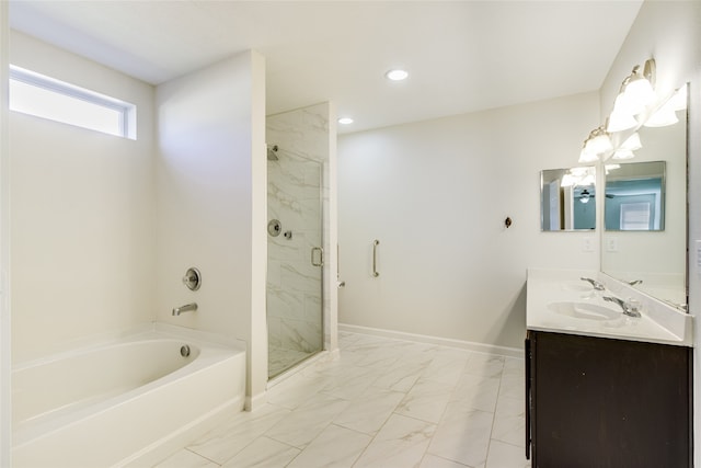 bathroom featuring vanity and independent shower and bath