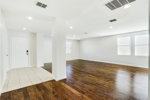 spare room with light hardwood / wood-style flooring