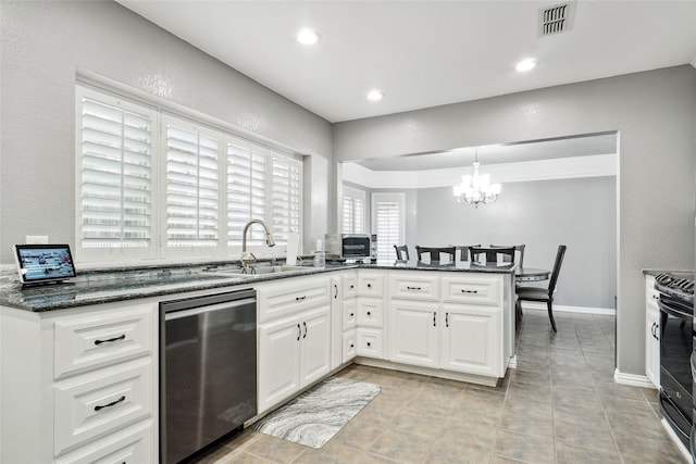 kitchen with visible vents, a peninsula, a sink, white cabinets, and black electric range oven