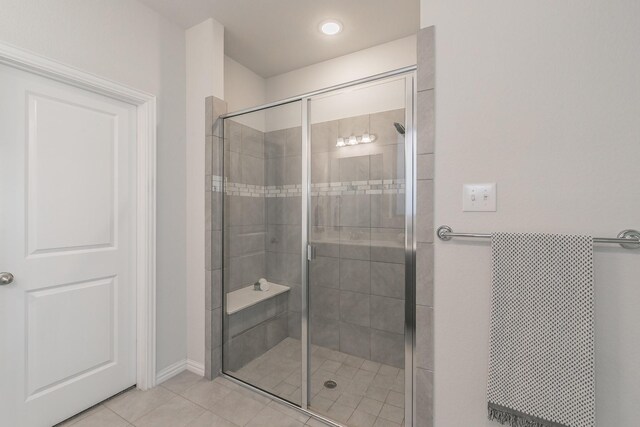 additional living space featuring ceiling fan and light colored carpet