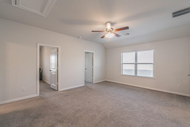 carpeted living room featuring lofted ceiling