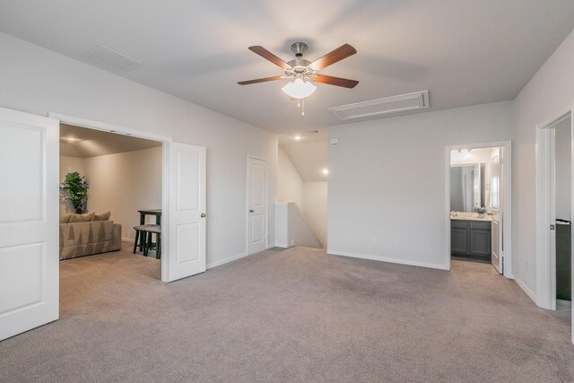 carpeted living room featuring vaulted ceiling