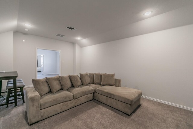 carpeted bedroom featuring ceiling fan and lofted ceiling