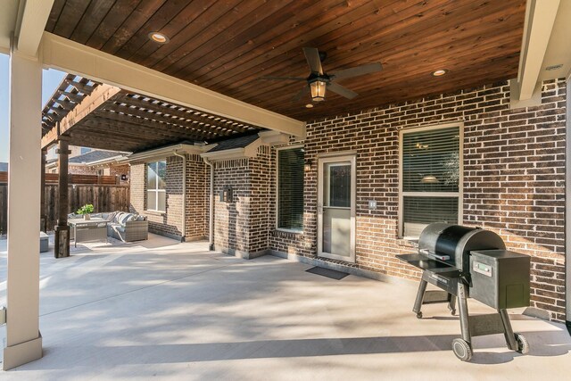 view of patio featuring outdoor lounge area and a pergola