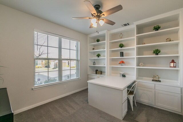 dining area featuring ceiling fan with notable chandelier