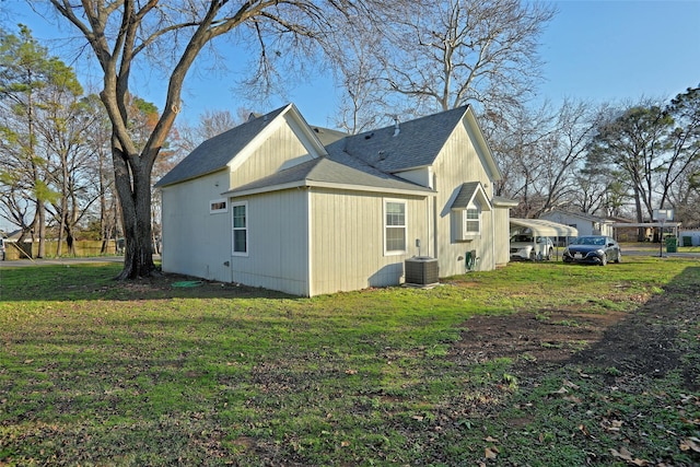 view of home's exterior featuring a yard and central air condition unit