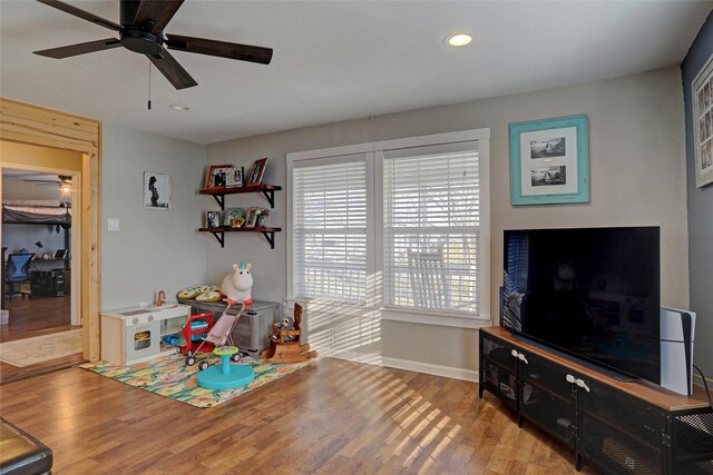 rec room featuring light wood-type flooring