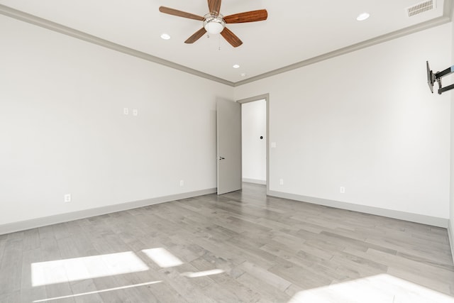 unfurnished room featuring light wood-type flooring, ceiling fan, and crown molding