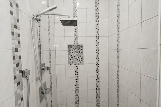 interior space featuring tiled shower