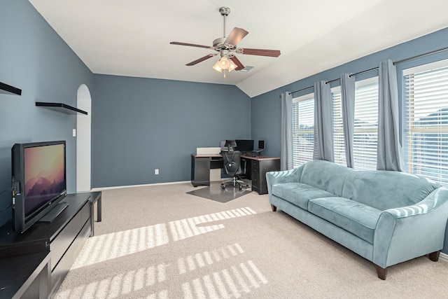 office area with light colored carpet, ceiling fan, and lofted ceiling