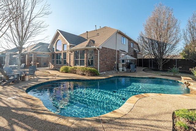 view of swimming pool featuring a patio area