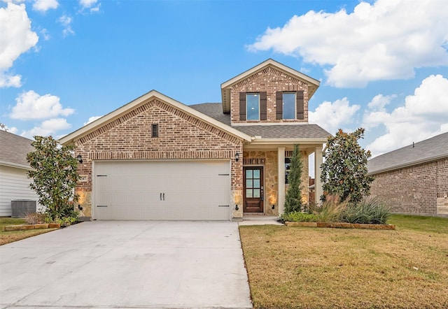 front facade with a garage, central AC, and a front yard