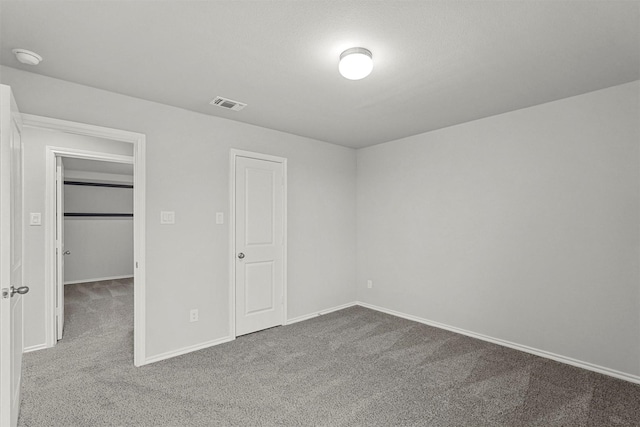 unfurnished bedroom featuring carpet